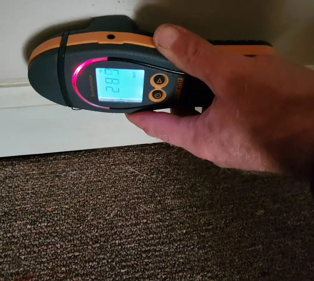 Moisture detection at baseboard during Burst Pipe Cleanup in Junction City